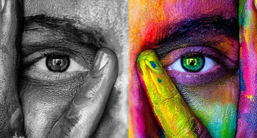 Painted face and hands. Half bw half colour