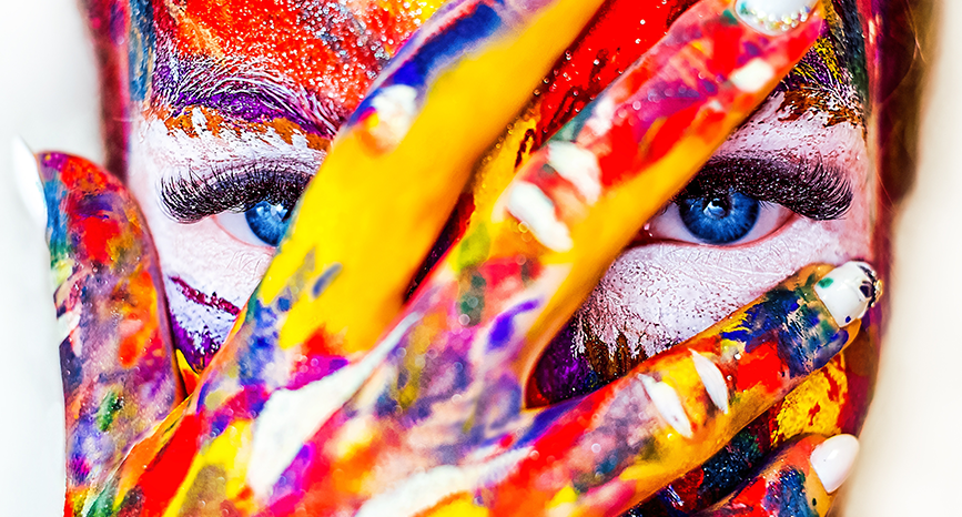 Woman with paint-splattered face